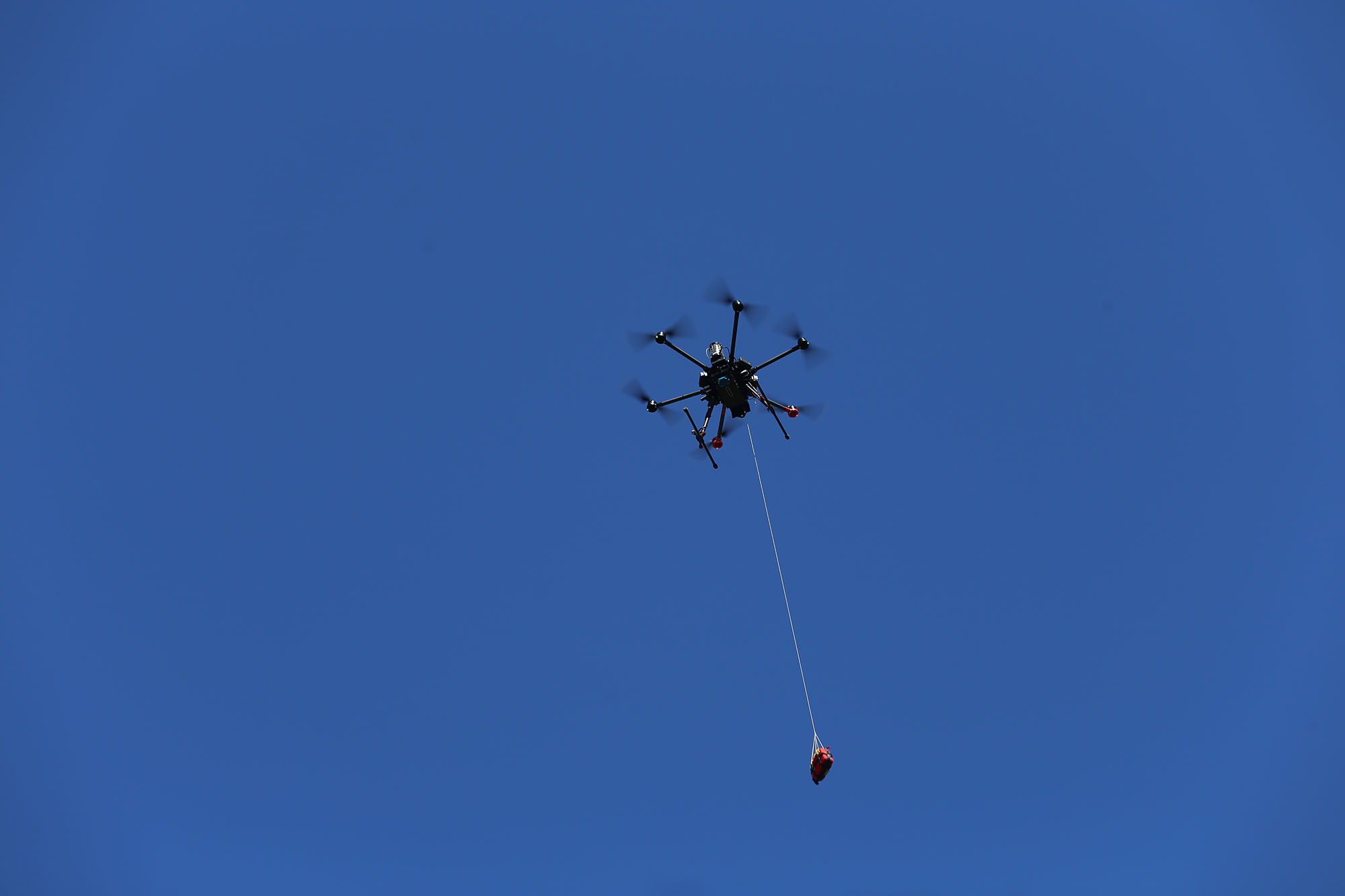 Drone delivering AED