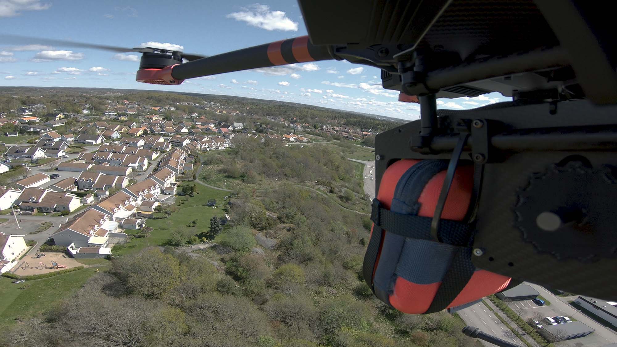 Drone with defibrillator attached
